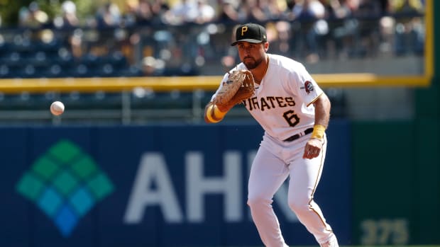 Sep 14, 2023; Pittsburgh, Pennsylvania, USA; Pittsburgh Pirates first baseman Alfonso Rivas (6) fields a ground ball for an out against Washington Nationals left fielder Travis Blankenhorn (not pictured) during the fifth inning at PNC Park. Mandatory Credit: Charles LeClaire-USA TODAY Sports